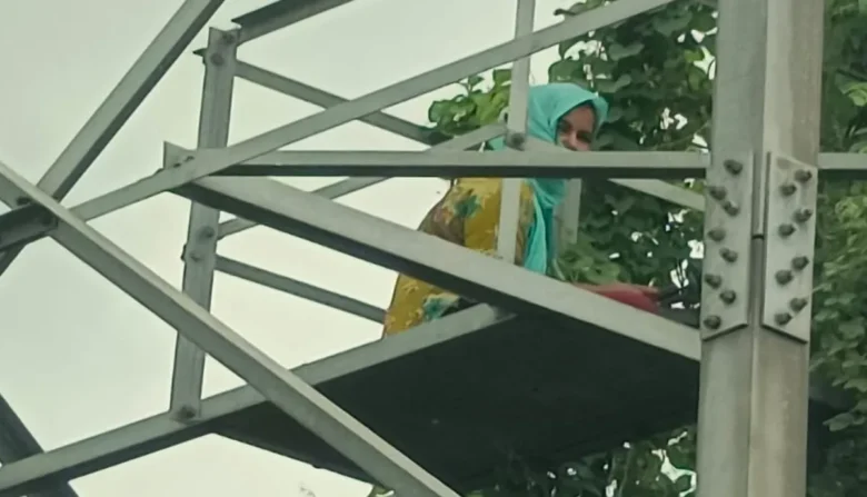 woman climbed the tower